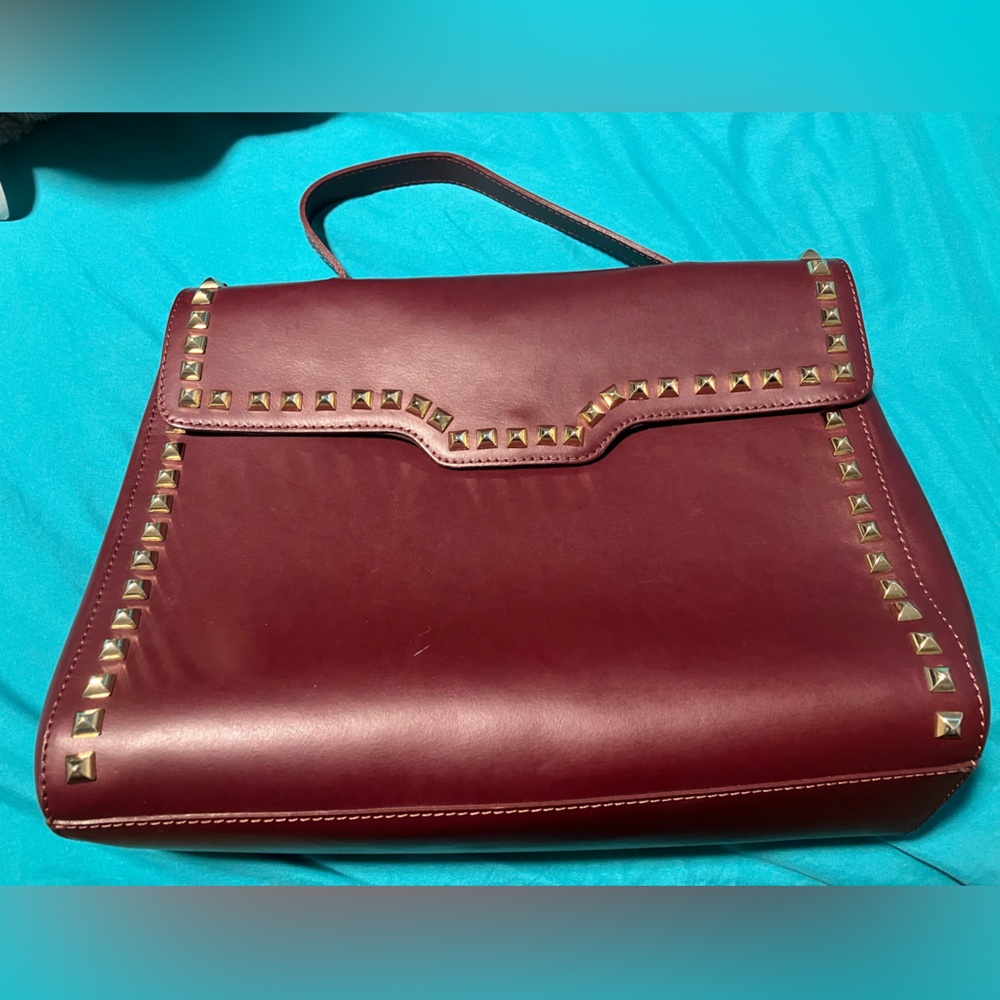 Alberta Di Canio Burgundy Satchel with Gold Accents. 100% Leather. Made in Italy